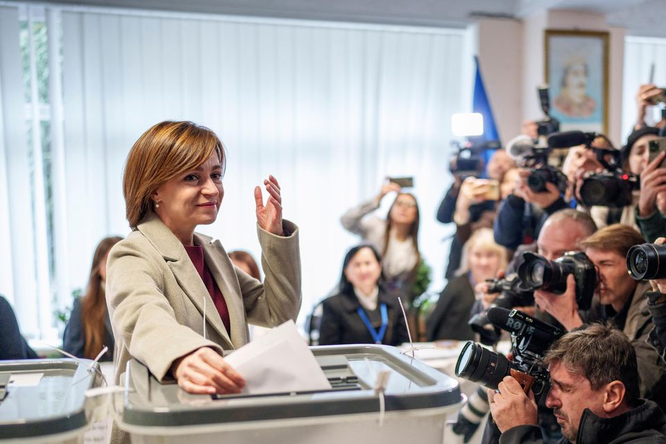 Moldova’s President Maia Sandu prepares to cast her vote, in Chisinau, Moldova (AP/Vadim Ghirda)