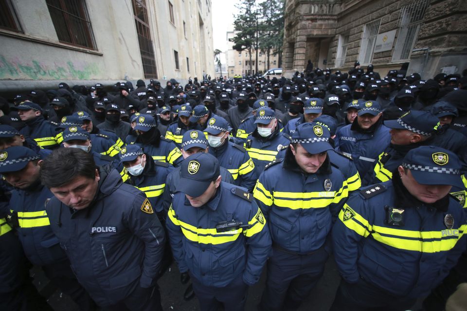 Police block a street in Tbilisi, Georgia, during a rally to demand new parliamentary elections (Zurab Tsertsvadze/AP)