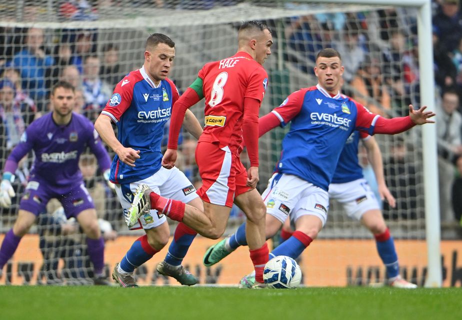 Cliftonville’s  Rory Hale up against Linfield's Kyle McClean in the Irish Cup final