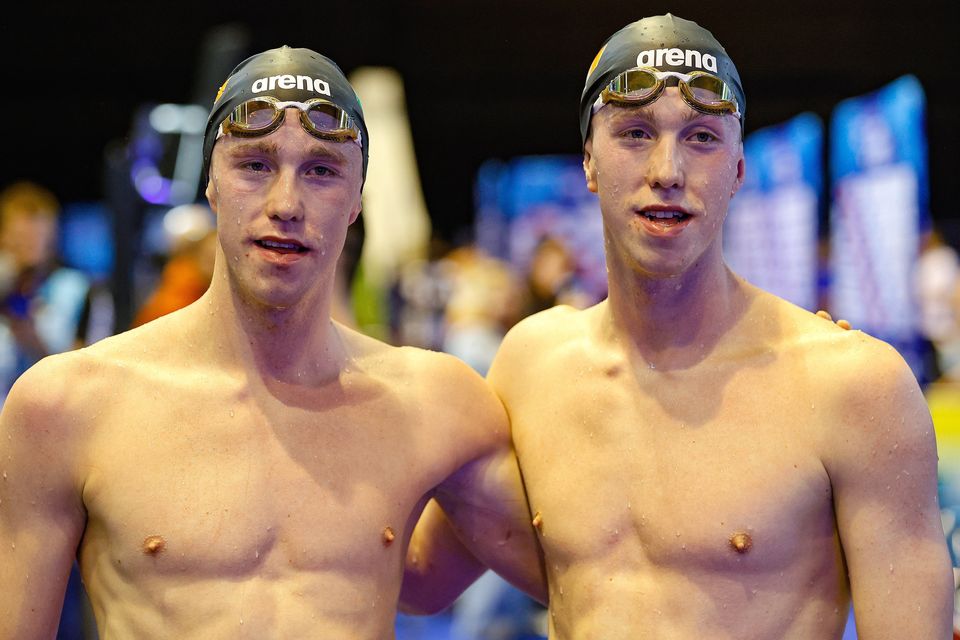 Nathan Wiffen (left) and twin brother Daniel push each other on in the pool