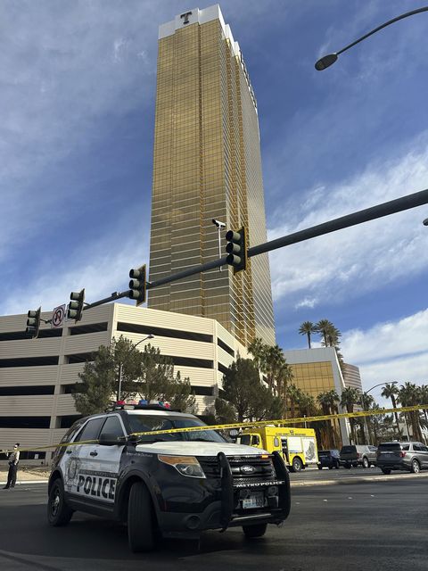 Police block the area in Las Vegas after a vehicle caught fire and exploded outside the lobby of President-elect Donald Trump’s hotel (Ty ONeil/AP)