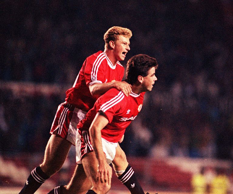 Mark Robins (left) during his days as a Red Devil (John Stillwell/PA)