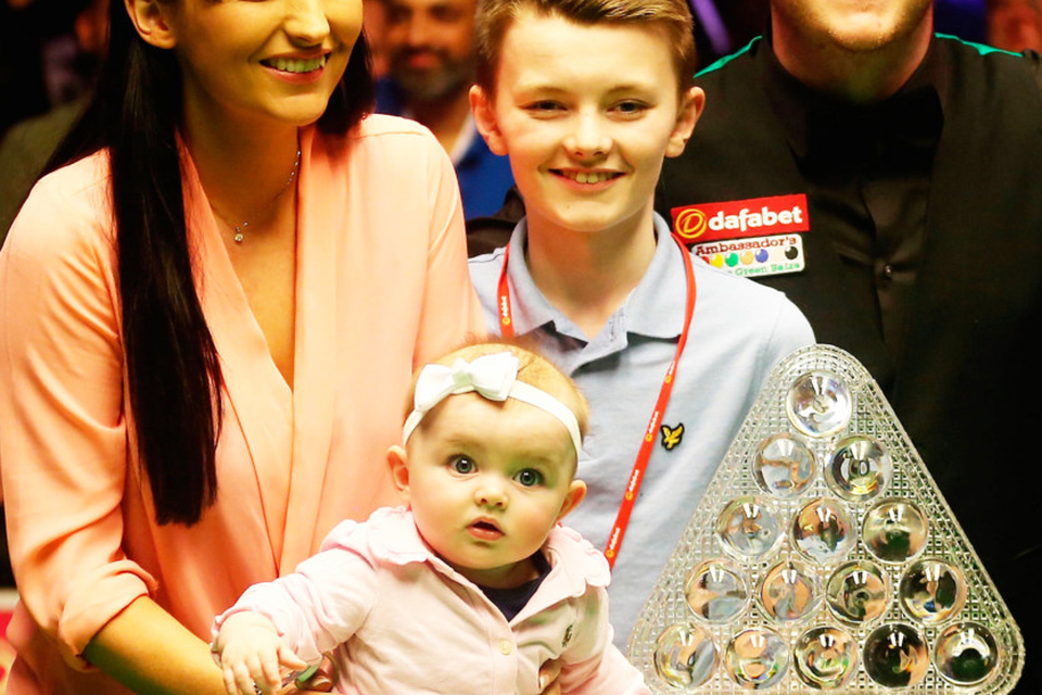 Mark Allen with his wife Kyla, stepson Robbie and daughter Harleigh after winning the Masters in January
