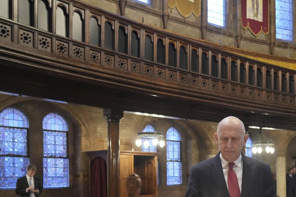 John Healey with Bishop of Ukraine Diocese Kenneth Nowakoski and shadow defence secretary James Cartlidge (Kin Cheung/PA)