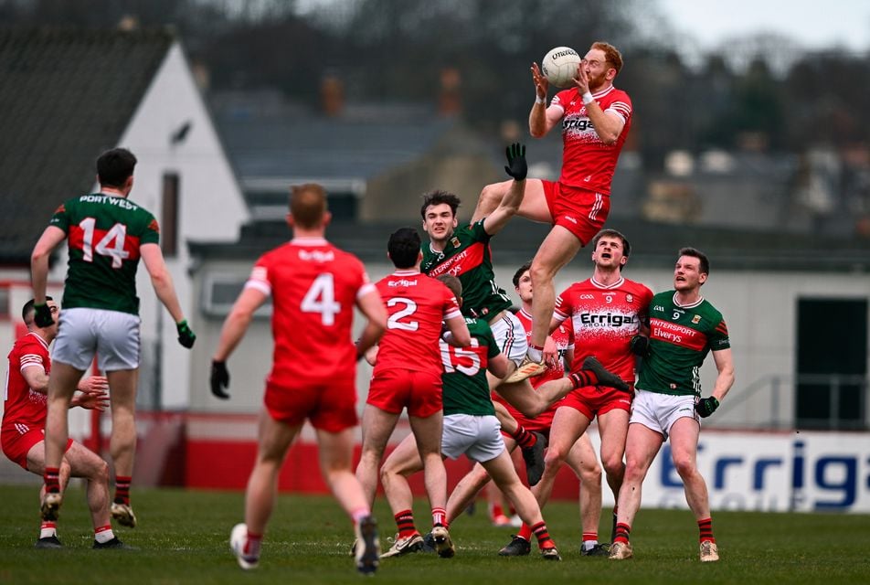 Derry's Conor Glass gathers possession of a high-ball during his side's Division One defeat to Mayo