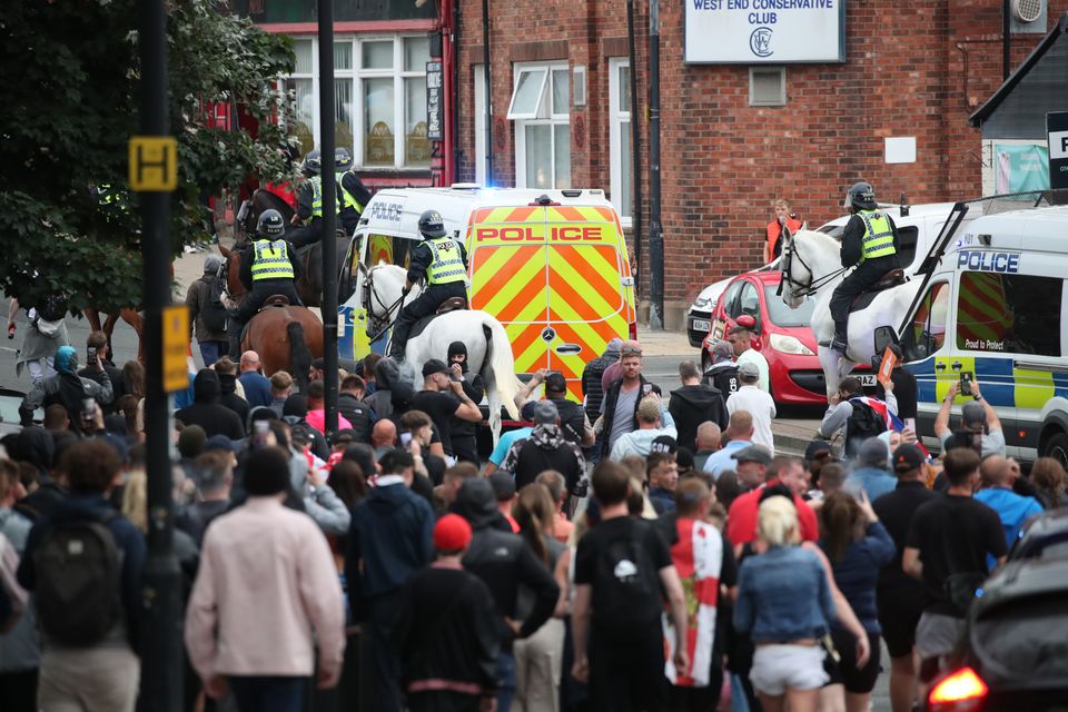 People protest in Sunderland city centre (Scott Heppell/PA)