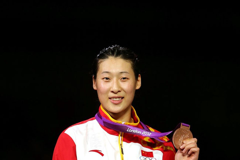 LONDON, ENGLAND - JULY 30:  Bronze medal winner Yujie Sun of China poses after the Women's Epee Individual Fencing Finals on Day 3 of the London 2012 Olympic Games at ExCeL on July 30, 2012 in London, England.  (Photo by Hannah Johnston/Getty Images)