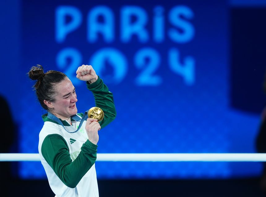 Ireland’s Kellie Harrington reacts after receiving her gold medal after winning in the Women’s 60kg final at Roland-Garros Stadium on the 11 day of the 2024 Paris Olympic Games in France (Peter Byrne/PA)