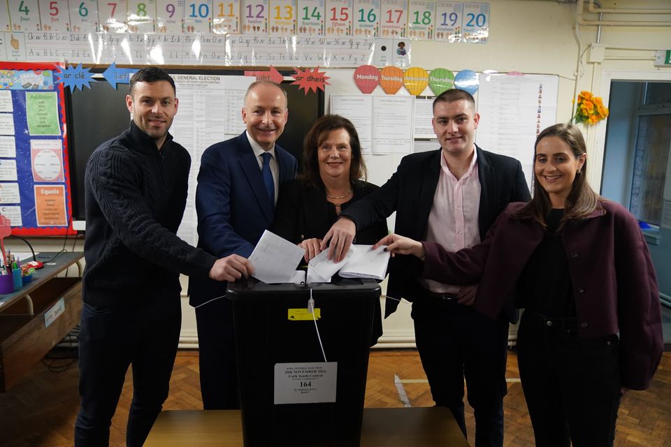 Fianna Fail Leader Micheal Martin with his family in Cork (Jacob King/PA)