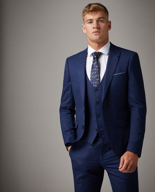 Blue x-slim fit wool rich mix and match suit jacket with peak lapels, £179, waistcoat, £60, trousers, £90