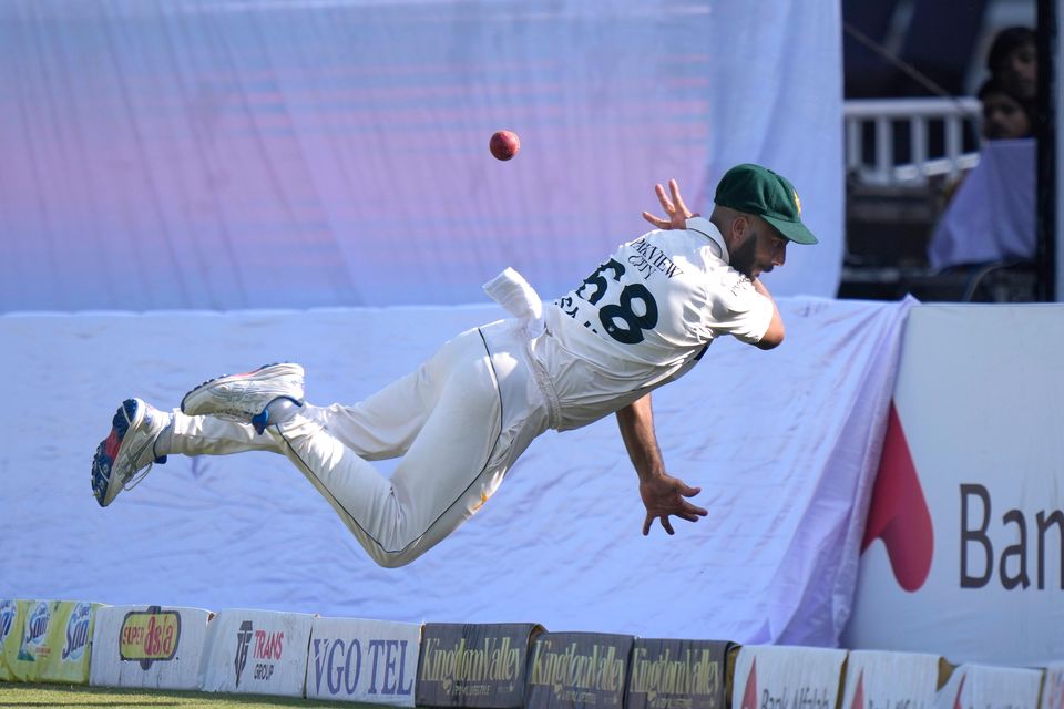 Pakistan’s Sajid Khan just failed to claim the wicket of Jamie Smith with this acrobatic catch (Anjum Naveed/AP)