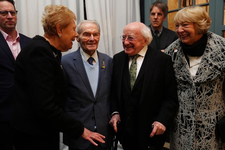 Irish President Michael D Higgins and his wife Sabina with Holocaust survivors Suzi Diamond (left) and Tomi Reichenthal at the Mansion House in Dublin (Brian Lawless/PA)