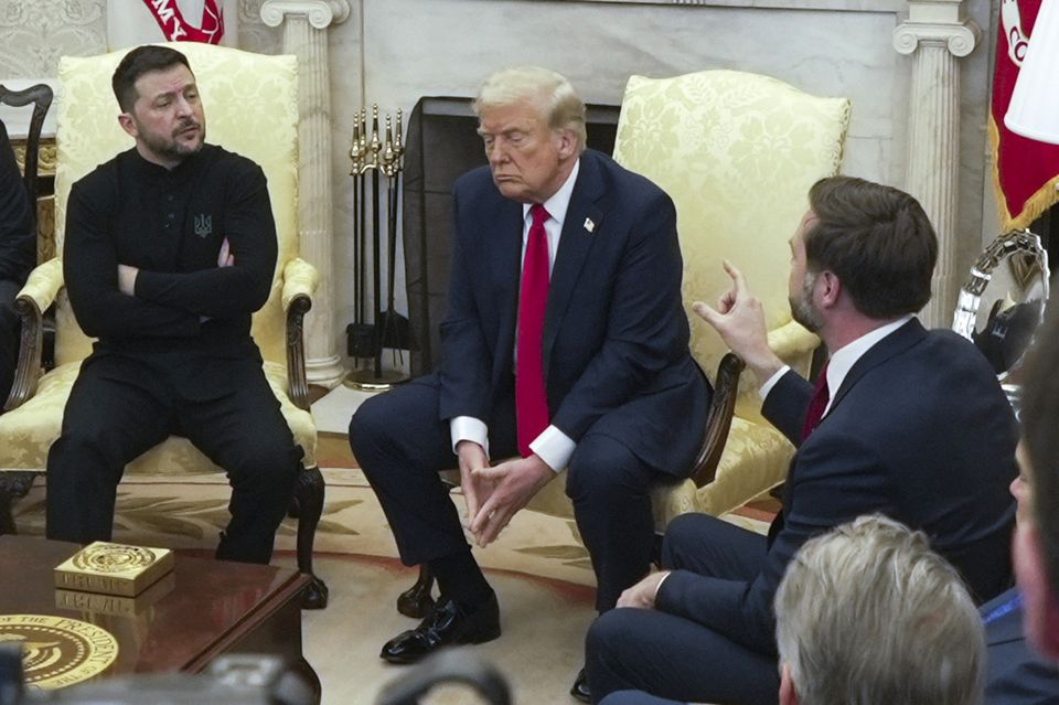 Vice president JD Vance, right, with Ukrainian President Volodymyr Zelensky, left, and President Donald Trump at the White House (Mystyslav Chernov/AP)