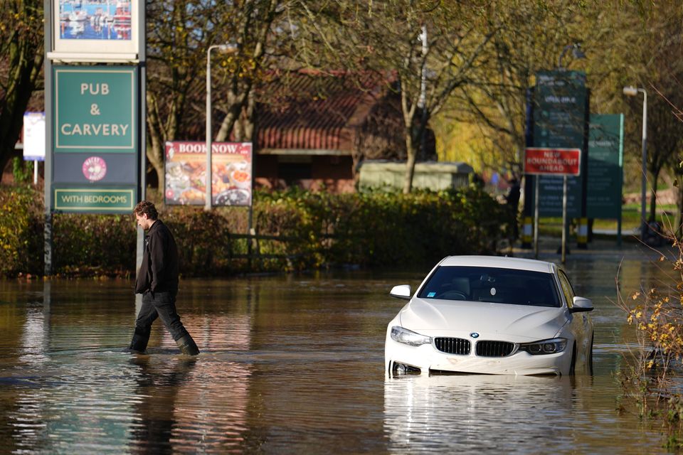 London Northwestern Railway reported that no rail services would operate through Northampton station due to the River Nene bursting its banks (Jordan Pettitt/PA)