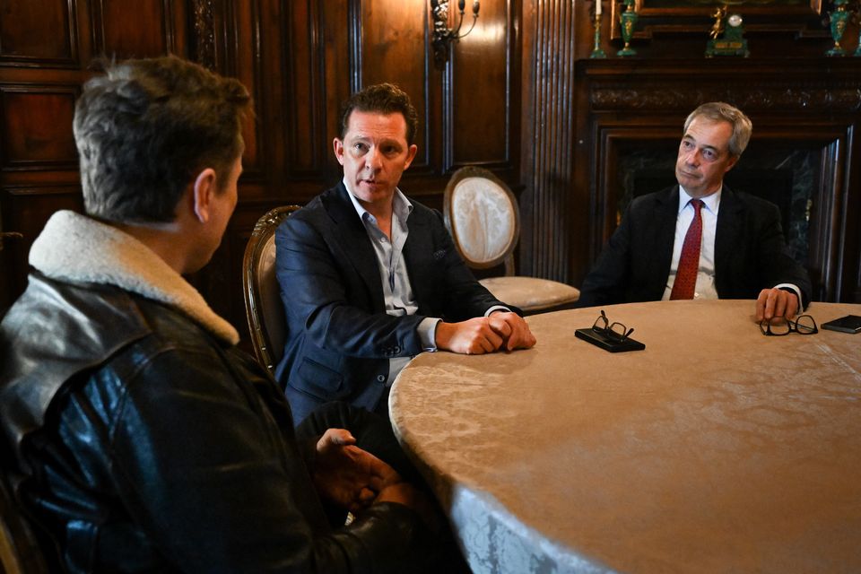 Nigel Farage and Nick Candy with Elon Musk at Mar-a-Lago, the Florida home of US President-elect Donald Trump (Stuart Mitchell/Reform UK/PA)