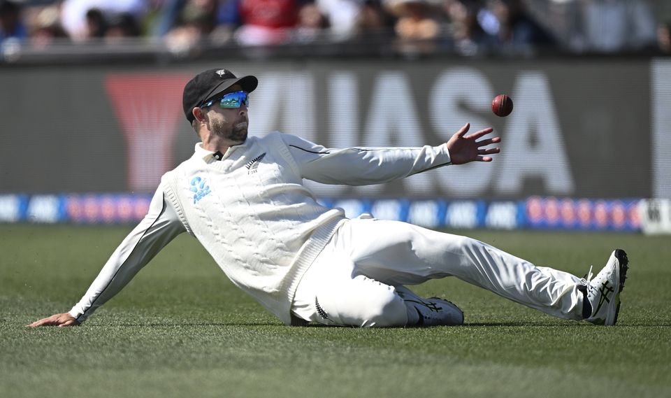 New Zealand’s Devon Conway drops a catch during play on the second day (Andrew Cornaga/Photosport/AP)