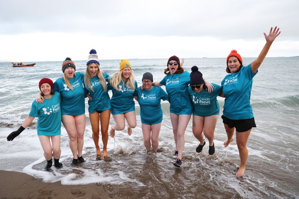 Swimmers take to the water for a New Year's Day Swim in aid of Cancer Focus Northern Ireland at Crawfordsburn, Wednesday, Jan 1, 2025. (Photo by Peter Morrison)