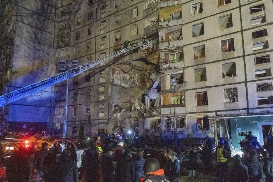 An apartment building in Kharkiv is damaged by a Russian attack (Kharkiv City Administration via AP)