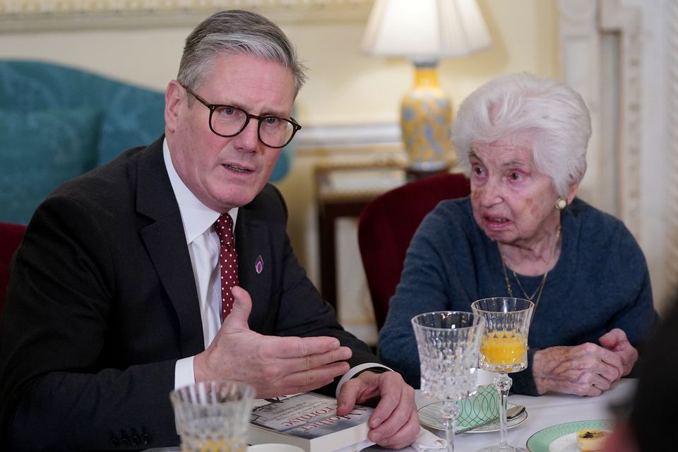 Sir Keir sat with Holocaust survivor Renee Salt during the event (Alberto Pizzoli/PA)