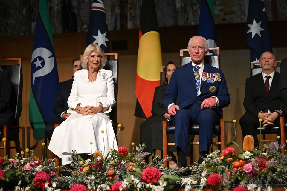 The King and Queen on stage during the event in Canberra (Victoria Jones/PA)