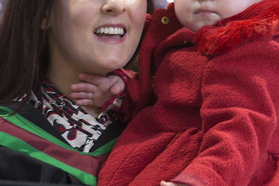 Psychology graduate Deirdre Timlin and her 2 year old daughter Eibhlin. (Photo: Nigel McDowell/Ulster University)