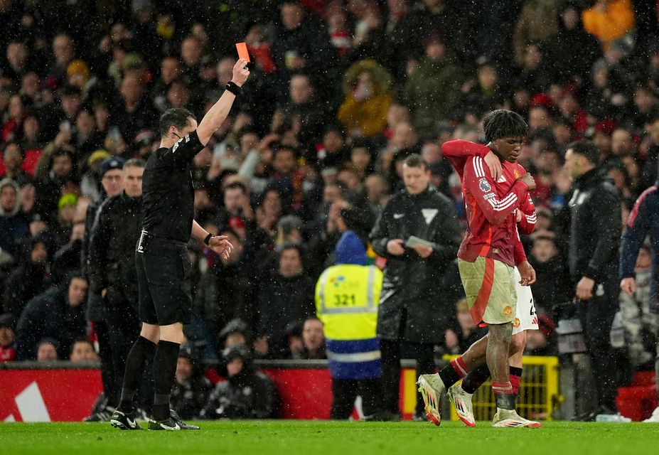 Patrick Dorgu was sent off but Manchester United beat Ipswich 3-2 (Martin Rickett/PA)