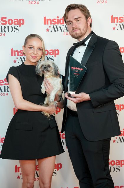 Eden Taylor-Draper with Minnie the dog and James Chase with the Best Pet Award at the Inside Soap Awards (Jeff Moore/PA)