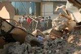 thumbnail: Rescue workers stand behind rubble after an earthquake in Portoviejo, Ecuador, Sunday, April 17, 2016. Rescuers pulled survivors from the rubble Sunday after the strongest earthquake to hit Ecuador in decades flattened buildings and buckled highways along its Pacific coast on Saturday night. The magnitude-7.8 quake killed hundreds of people. (AP Photo/Carlos Sacoto)