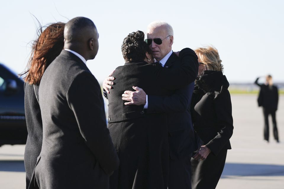 President Joe Biden is greeted by New Orleans mayor LaToya Cantrell, representative Cleo Fields and representative Troy Carter and wife Andree Carter (Stephanie Scarbrough/AP)