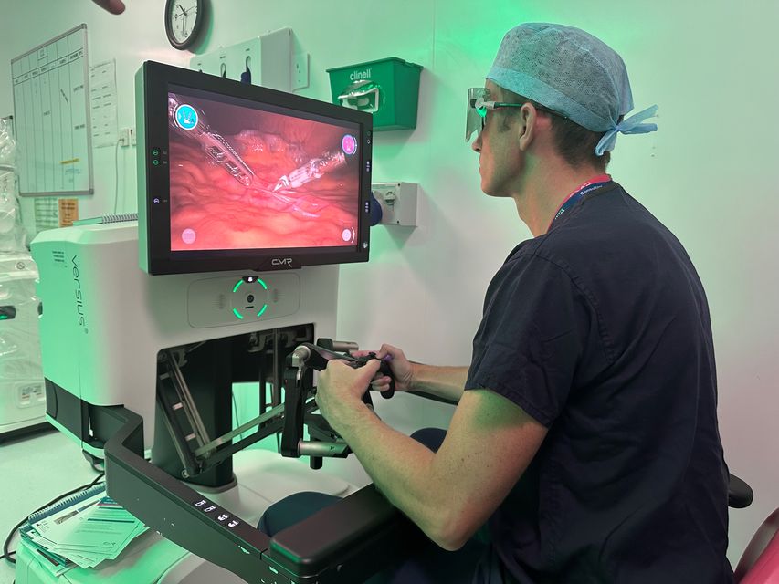 Paediatric urologist Ewan Brownlee operates using the Versius robot at Southampton Children’s Hospital (University Hospital Southampton/PA)