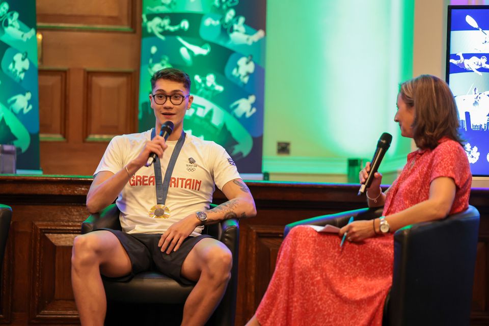 Swimmer Jack McMillan, gold medallist at Paris 2024, chats to broadcaster Claire McCollum about his journey from pool to podium, at a special reception held in City Hall to celebrate a historic sporting summer for Belfast-based Olympic and Paralympic athletes.