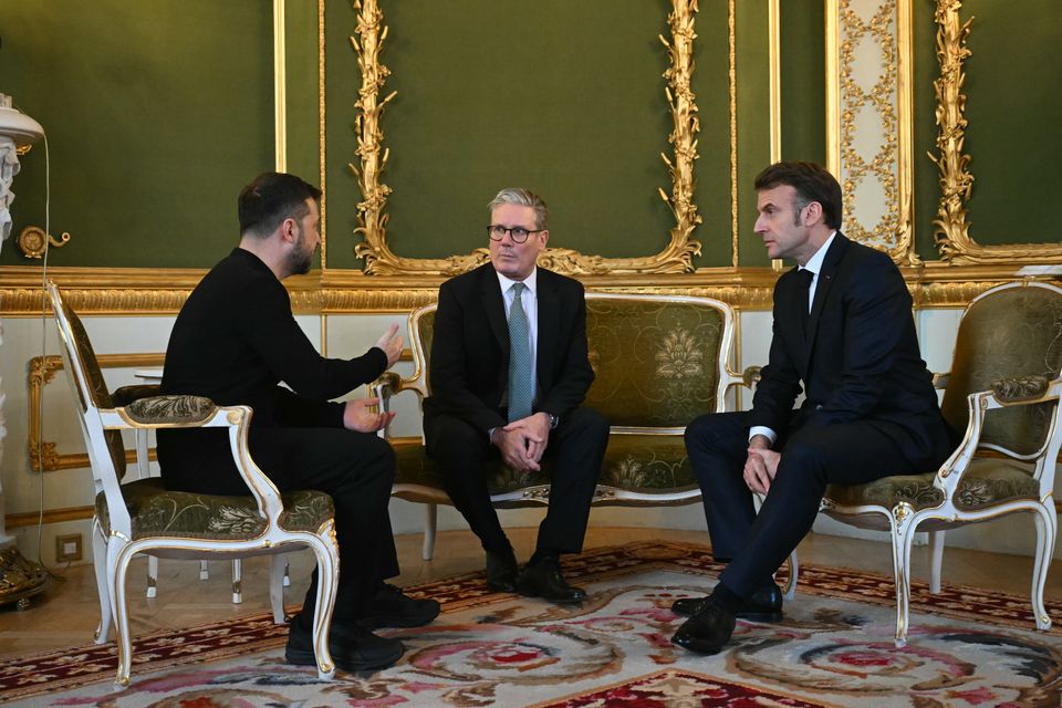 Ukraine’s President Volodymyr Zelensky, Prime Minister Sir Keir Starmer and France’s President Emmanuel Macron met during the summit on Sunday (Justin Tallis/PA)