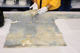 thumbnail: The work shirt of W. Allen, a 3rd class passenger on the Titanic, is shown as part of the artifacts collection at a warehouse in Atlanta, Friday, Aug 15, 2008. The 5,500-piece collection contains almost everything recovered from the wreckage of the RMS Titanic, which has sat 2.5 miles below the surface of the Atlantic ocean since the boat sank on April 15, 1912.