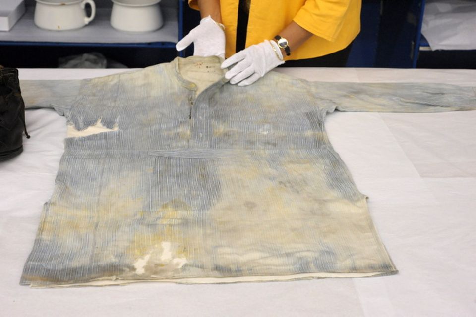 The work shirt of W. Allen, a 3rd class passenger on the Titanic, is shown as part of the artifacts collection at a warehouse in Atlanta, Friday, Aug 15, 2008. The 5,500-piece collection contains almost everything recovered from the wreckage of the RMS Titanic, which has sat 2.5 miles below the surface of the Atlantic ocean since the boat sank on April 15, 1912.