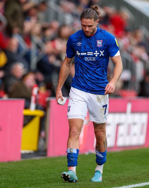 Wes Burns limps off against Exeter in League One in 2022 (Steven Paston/PA)