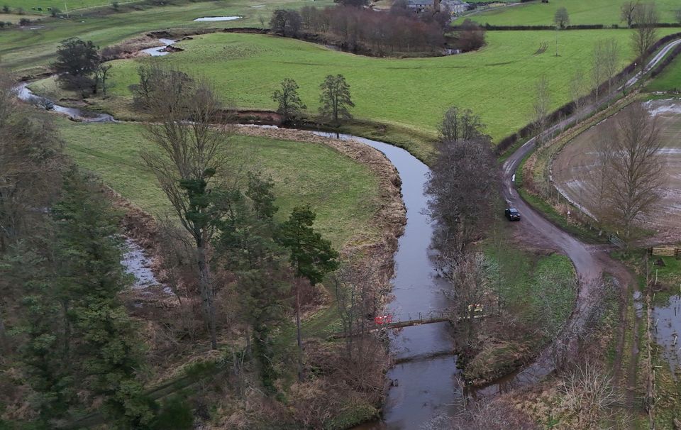 The river was swollen during Storm Darragh (Owen Humphreys/PA)