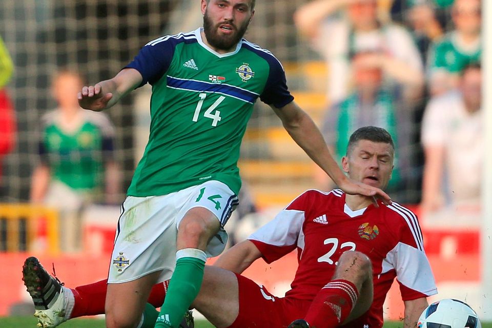 Northern Ireland's Stuart Dallas (left) and Belarus' Nikolai Yanush battle for the ball during the International Friendly at Windsor Park, Belfast. PRESS ASSOCIATION Photo. Picture date: Friday May 27, 2016. See PA story SOCCER N Ireland. Photo credit should read: Niall Carson/PA Wire. RESTRICTIONS: Editorial use only, No commercial use without prior permission, please contact PA Images for further information: Tel: +44 (0) 115 8447447.
