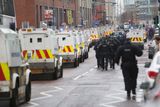 thumbnail: Loyalist protestors and PSNI officers pictured at Belfast City Hall on 22 December 2012