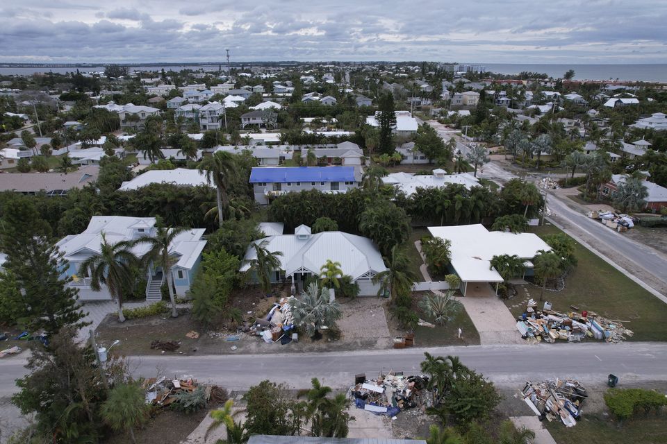 Milton will bring fresh woe to communities already devastated by Hurricane Helene (AP)