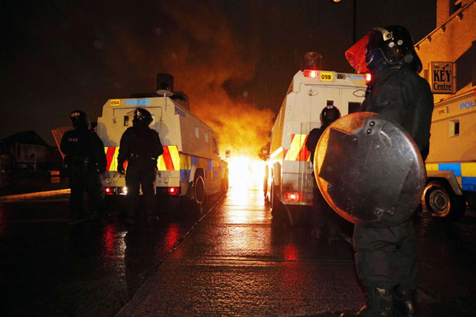 A car burns in the Castlereagh Street of east Belfast