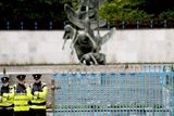 thumbnail: Gardai and security outside the Garden of Remembrance in Dublin city centre, ahead of the royal Visit by Britain's Queen of Elizabeth II and her husband the Duke of Edinburgh this week.