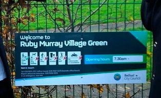 The current small sign at the Ruby Murray Village Green