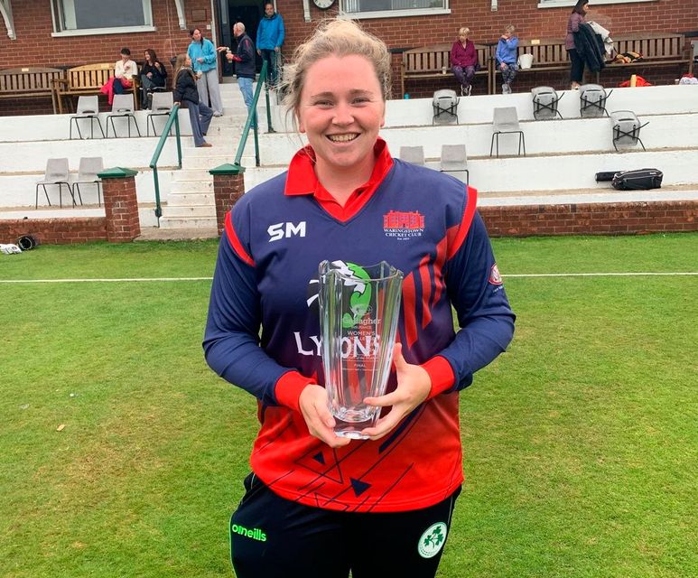 Naomi Matthews celebrates with the Player of the Match award following Waringstown's win over Holywood