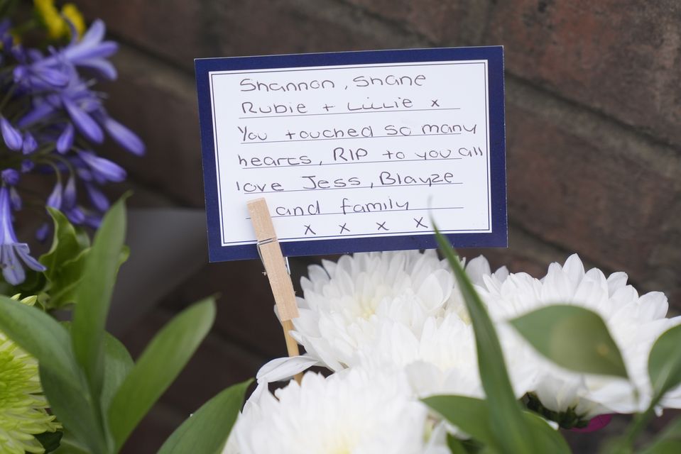 Flowers and tributes laid near the scene on the A61 (Danny Lawson/PA)