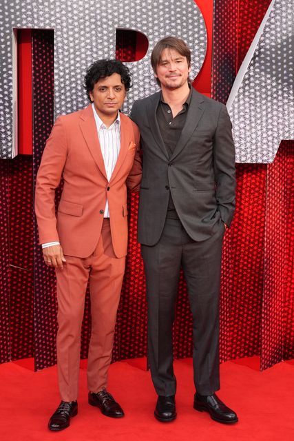 M. Night Shyamalan and Josh Hartnett at a special screening of Trap (Ian West/PA)