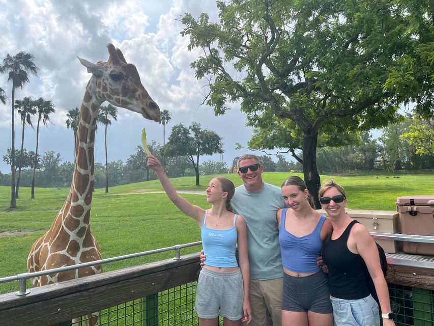 Patti the giraffe, Evelyn, Richard, Isla and Rachel at Serengeti Safari at Busch Gardens