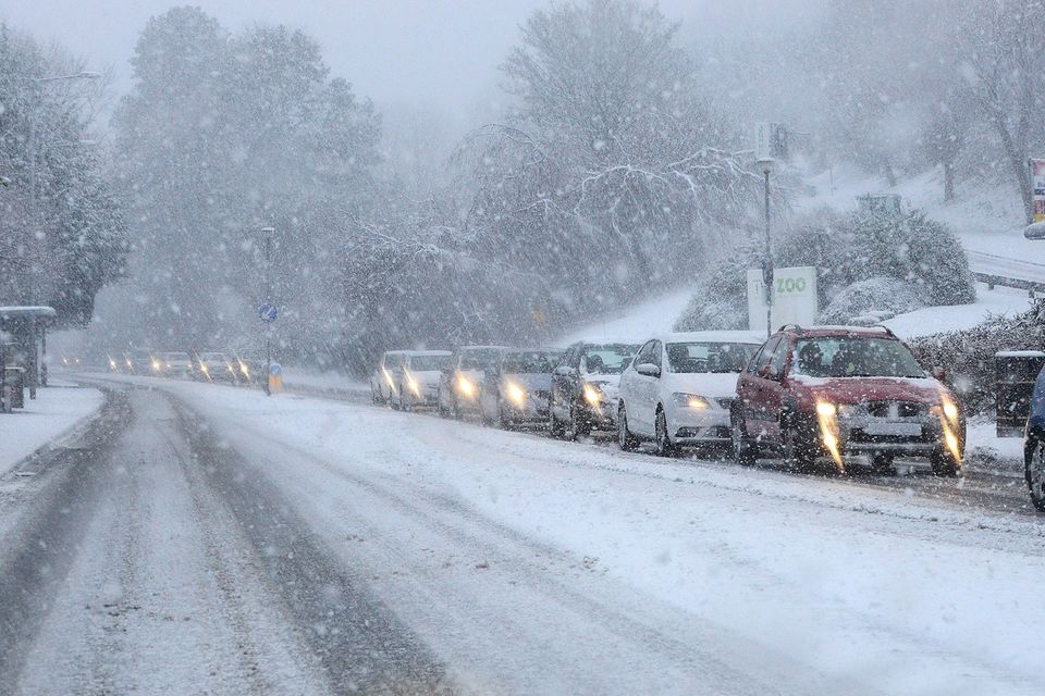 Heavy snow has caused widespread travel disruption in Northern Ireland, with bus and rail services affected and some roads closed.