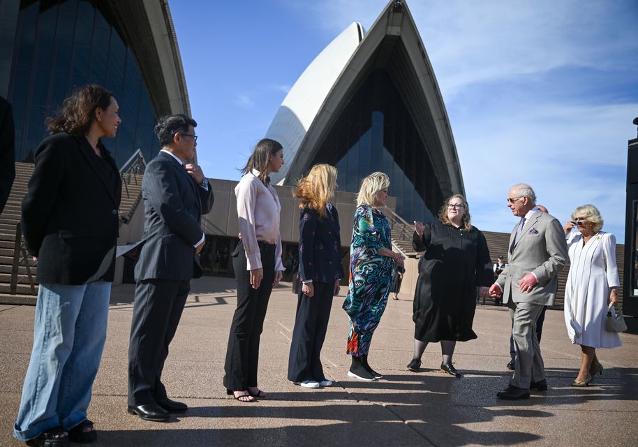 Charles and Camilla met Dame Joanna Lumley, actress Heather Mitchell, Francis Rings from the Bangarra Dance Theatre, acrobat/dancer Lucia Richardson, tenor Jin Tea Kim and Alexander Morris, principal bass clarinet with the Sydney Symphony Orchestra at the Sydney Opera House (Victoria Jones/PA)