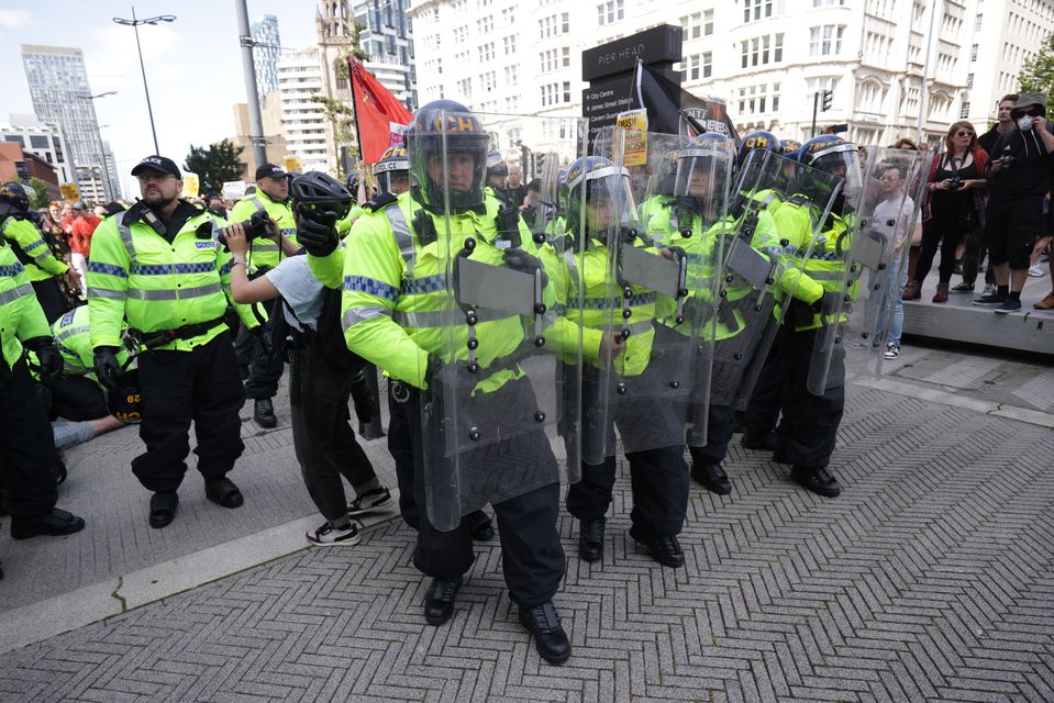 Riot police were deployed on the streets of Liverpool (James Speakman/PA)