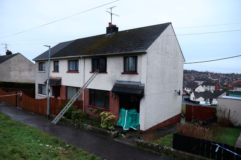 The scene in the Cunninghams Lane area of Dungannon after four people have been "led to safety" by police officers from a house fire in Co Tyrone.  Liam McBurney/PA Wire